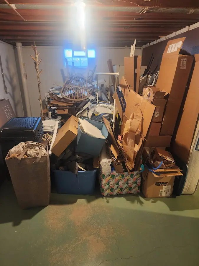 Roll-off dumpster container at job site for 15 Yard Dumpster Rental in Edgewater